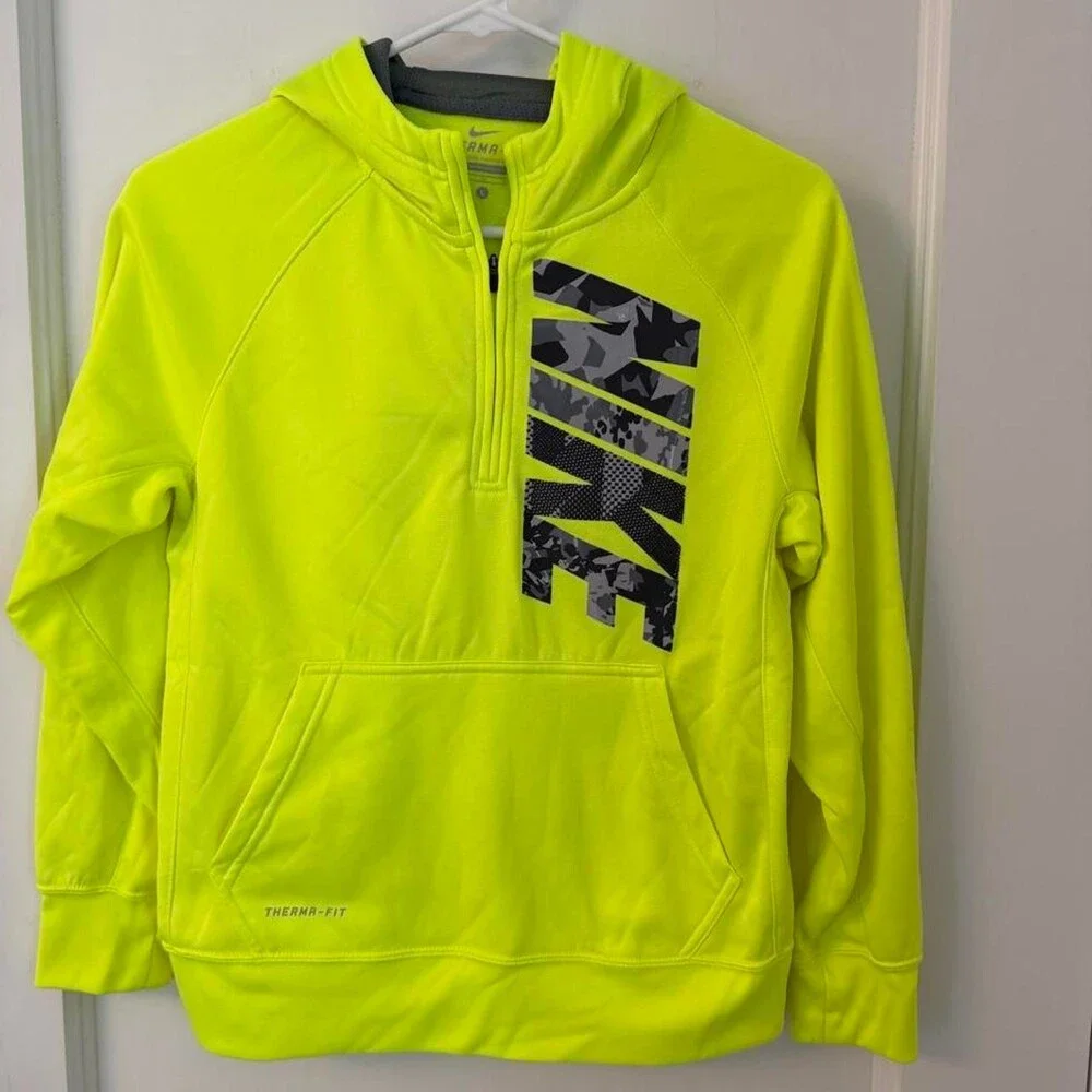 Nike Therma-Fit Hoodie in neon yellow with black camouflage Nike logo, size yout